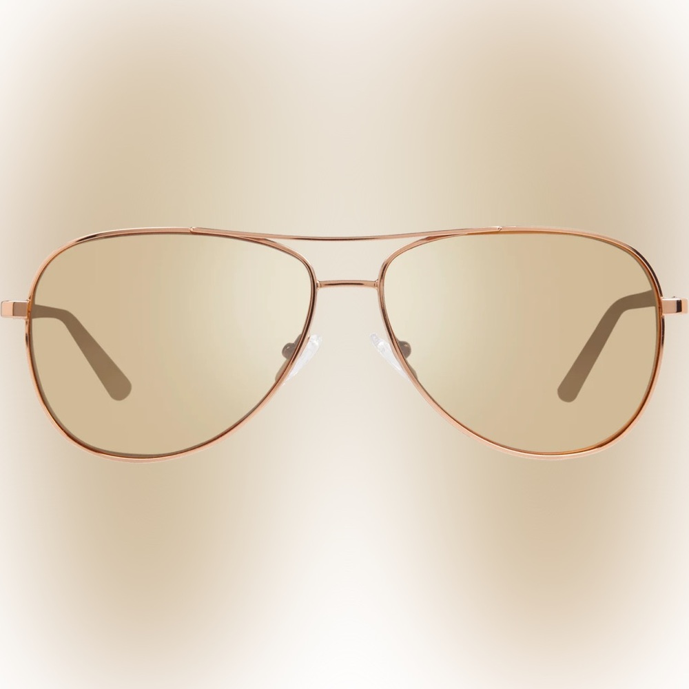 never worn REVO sunglasses Frame: Rose Gold Lens 100% Polarized UV Protection